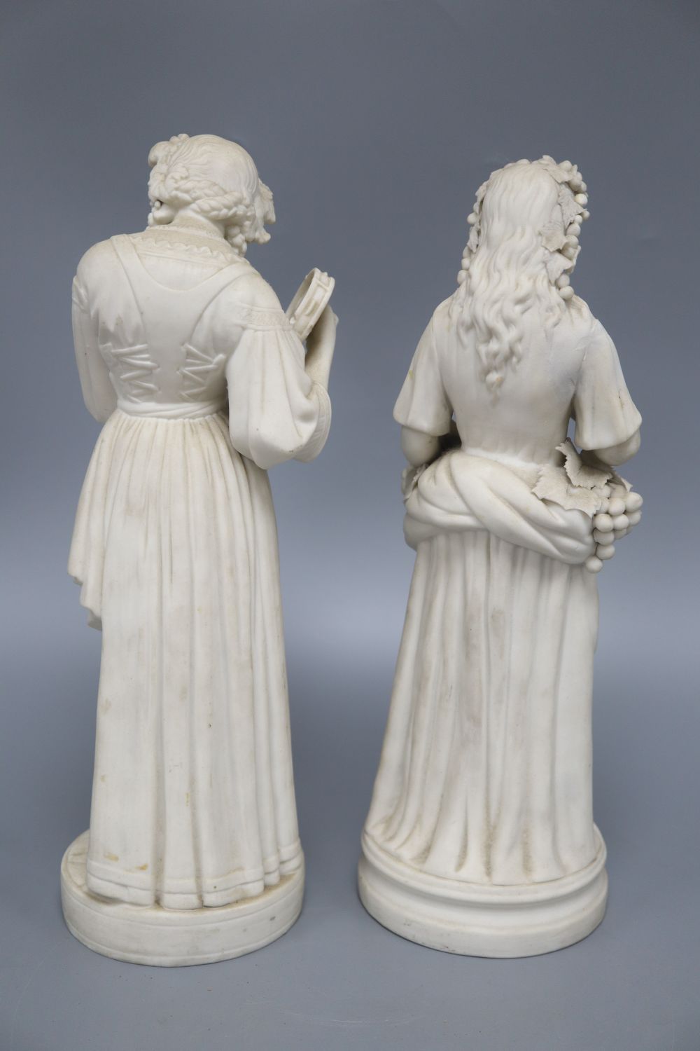 Two 19th century parian figures of maidens, tallest 33cm